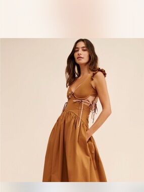 Free People Aliña Liu Pearl Bow
Mini Dress Sz. L
